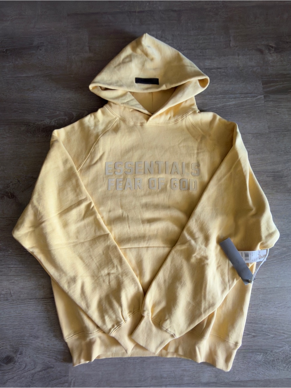 Fear of God Essentials Pale Yellow Logo Hoodie